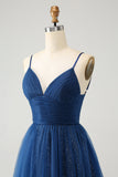 Vestido de cóctel azul marino con tirantes finos y espalda con cordones de tul