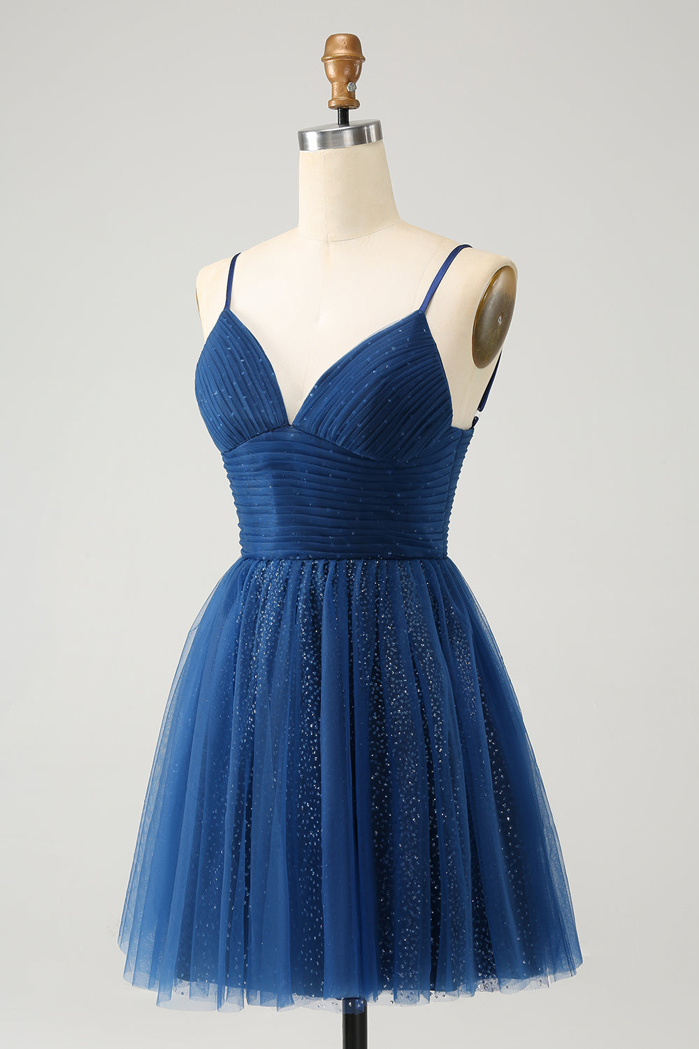 Vestido de cóctel azul marino con tirantes finos y espalda con cordones de tul