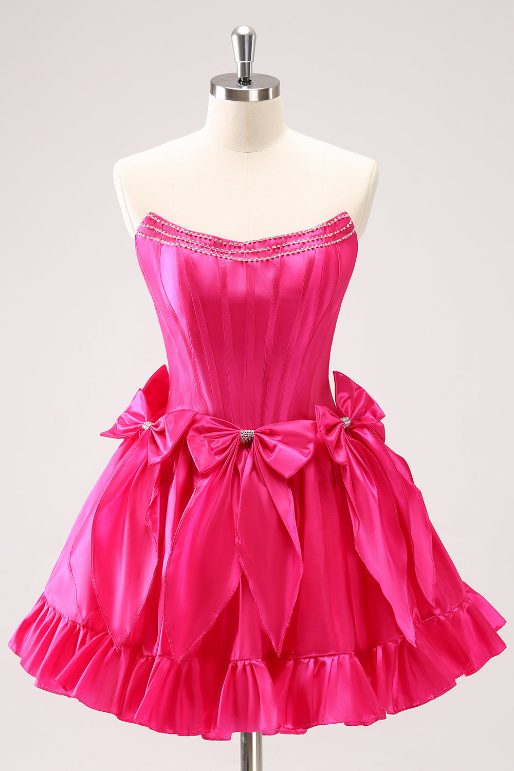 Vestido de fiesta corto de corte A con corsé sin tirantes y lazos en color fucsia