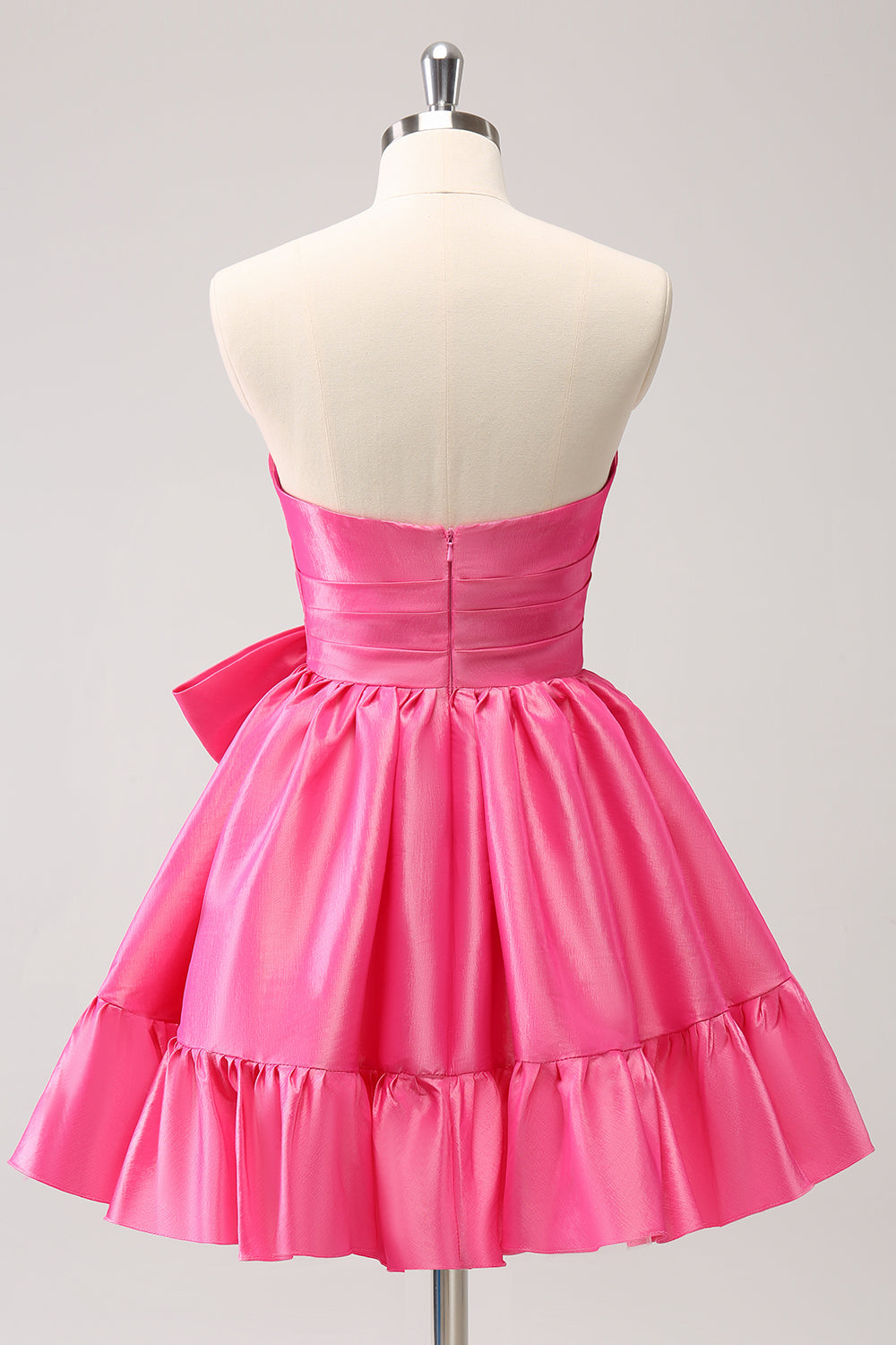 Vestido de fiesta corto fucsia con volantes sin tirantes y corte A con lazo