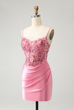 Vestido de fiesta corto ajustado con tirantes finos y corsé en color rosa intenso con apliques