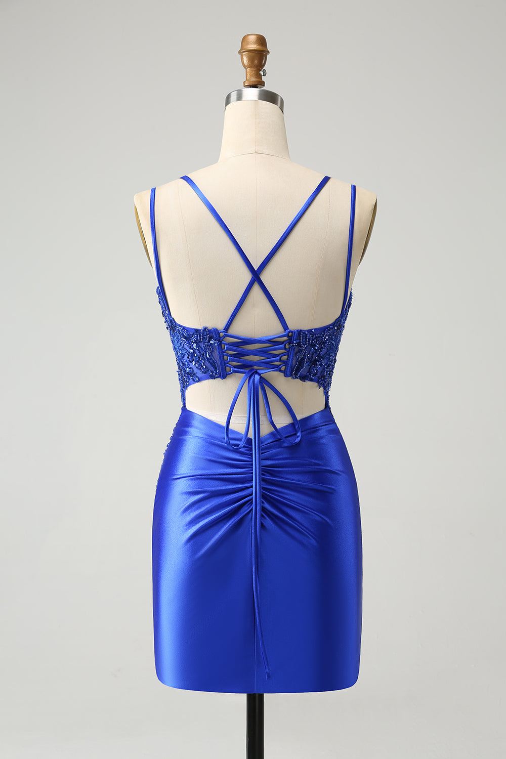 Vestido de fiesta corto ajustado con tirantes finos y corsé azul real