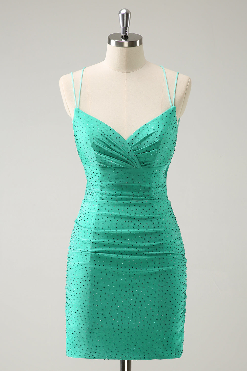 Vestido de fiesta corto ajustado con cuentas espalda descubierta y tirantes finos de color verde