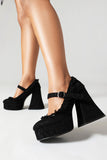 Zapatos negros de tacón cuadrado con plataforma y punta cerrada