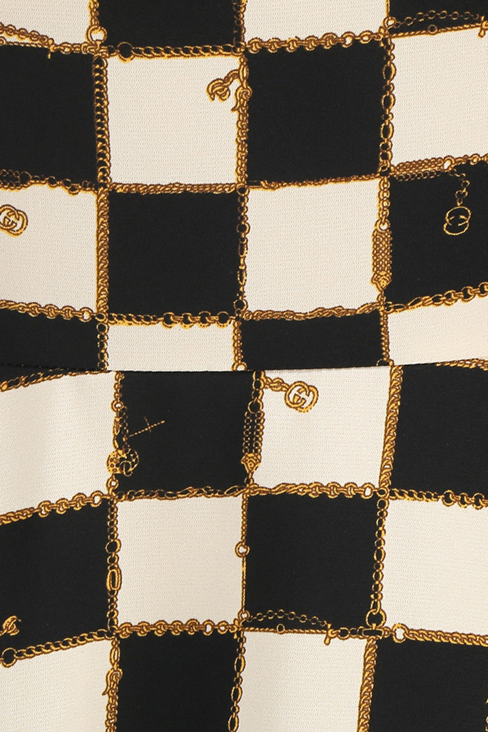 Vestido corto halter a cuadros de rejilla negra de la década de 1950