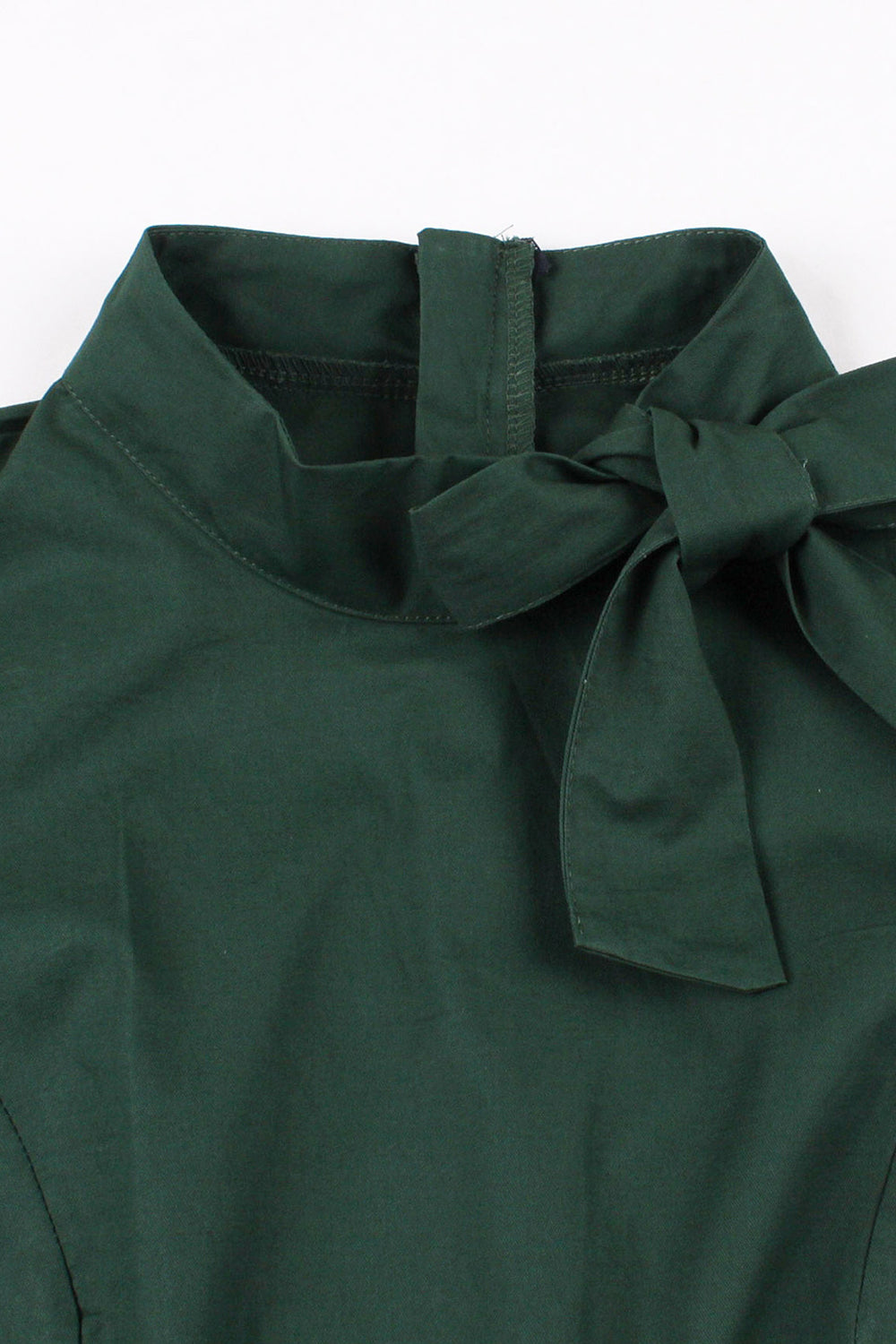 Vestido vintage de la década de 1950 con cuello alto verde oscuro