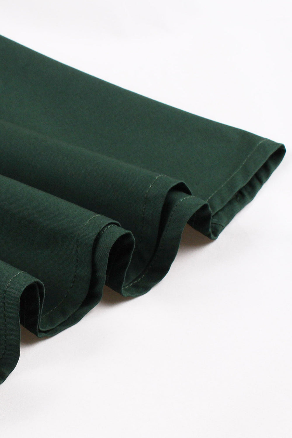 Vestido vintage de la década de 1950 con cuello alto verde oscuro