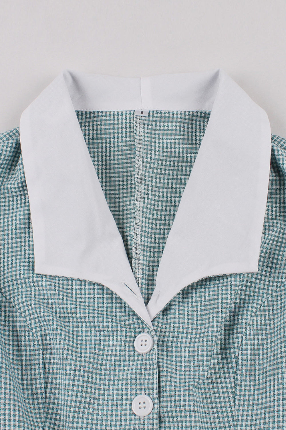 Vestido verde a cuadros sin mangas swing de la década de 1950