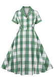 Vestido retro de manga corta verde a cuadros de la década de 1950 con lazos