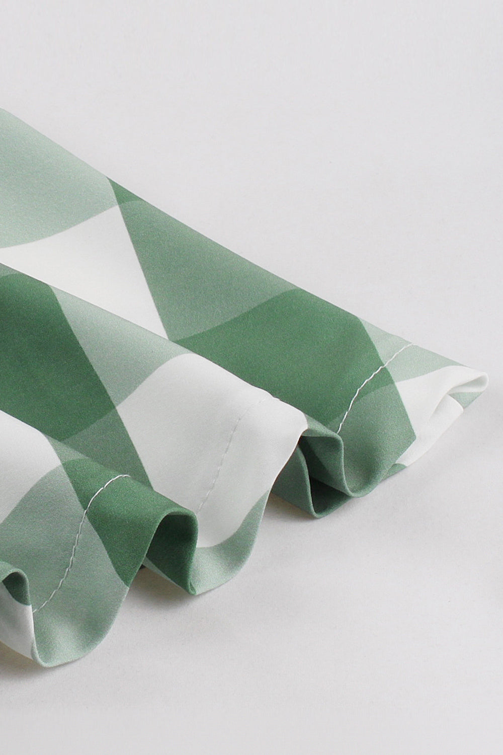 Vestido retro de manga corta verde a cuadros de la década de 1950 con lazos