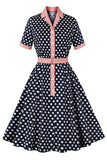 Vestido Pinup de lunares rosa negro de la década de 1950
