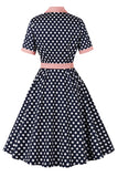 Vestido Pinup de lunares rosa negro de la década de 1950