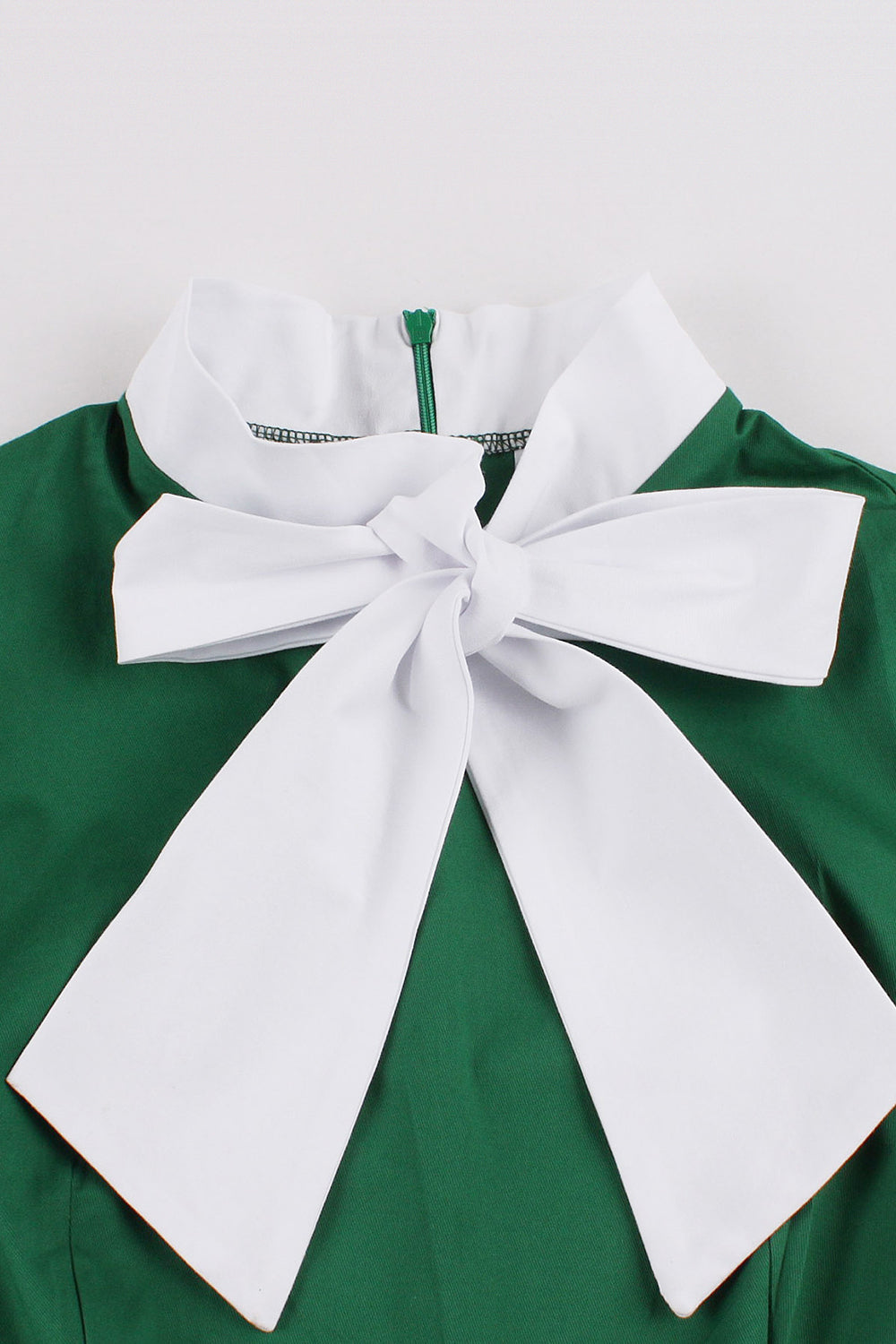 Vestido asimétrico con volantes de la década de 1950 en verde oscuro con lazos