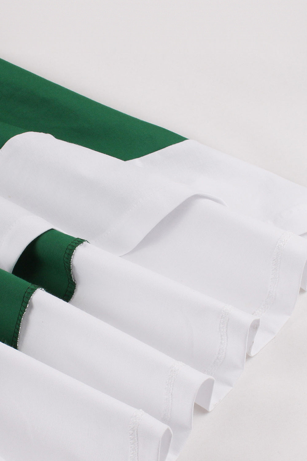Vestido asimétrico con volantes de la década de 1950 en verde oscuro con lazos