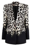 Blazer de mujer con estampado de salto en blanco y negro con solapa de pico con un botón