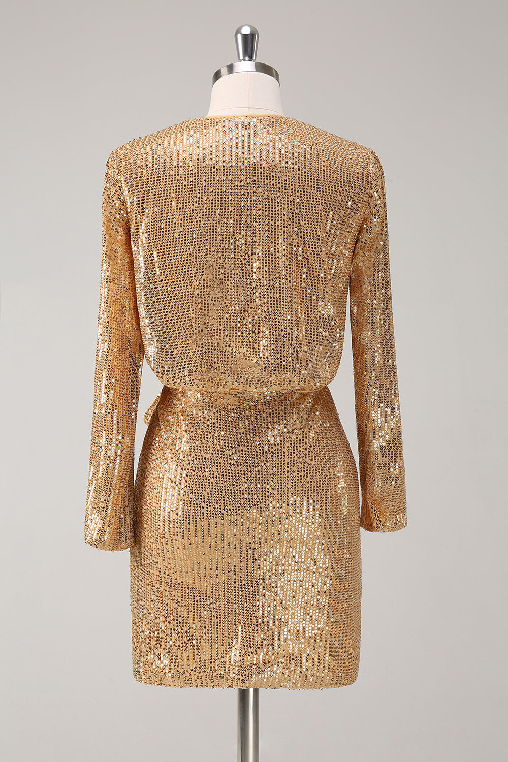 Vestido de fiesta corto y ajustado con escote en V con purpurina dorada