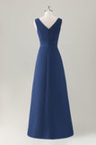 Vestido de dama de honor largo con volantes en línea A azul oscuro con abertura