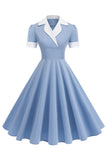 Vestido azul A Line con escote en V de la década de 1950 y mangas cortas