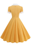 Vestido azul A Line con escote en V de la década de 1950 y mangas cortas