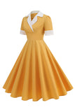Vestido azul A Line con escote en V de la década de 1950 y mangas cortas