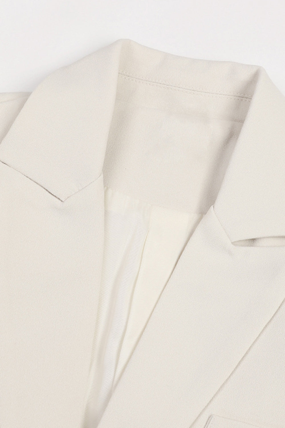 Blazer largo irregular floral marfil para mujer