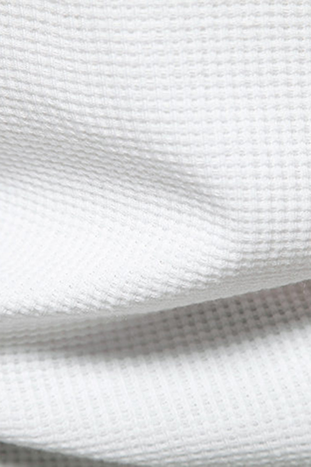 Camisa de punto blanco de algodón y cuello redondo de manga corta para hombre