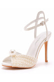 Stiletto de punta abierta champán con perla
