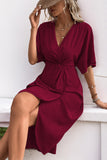 Vestido de verano negro con escote en V y medias mangas