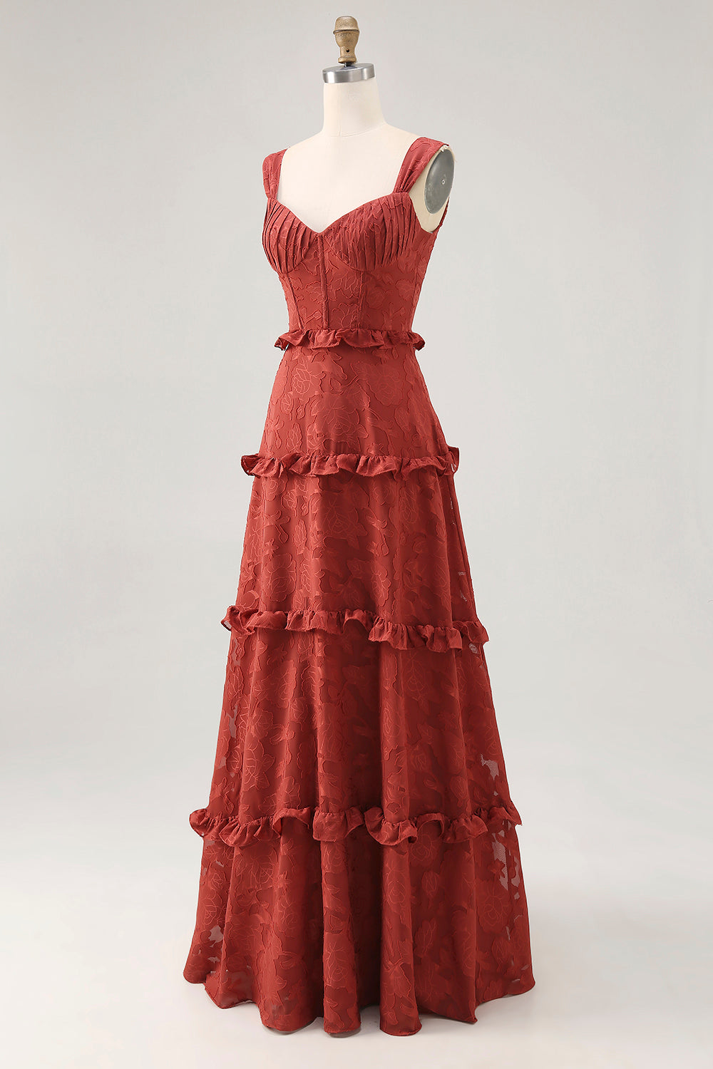 Vestido largo de invitada de boda con volantes en terracota floral