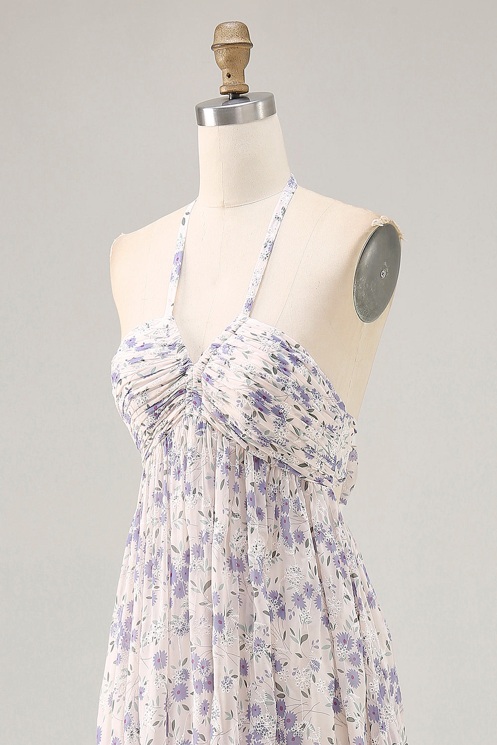 Vestido largo de invitada a boda con falda azul fruncido floral