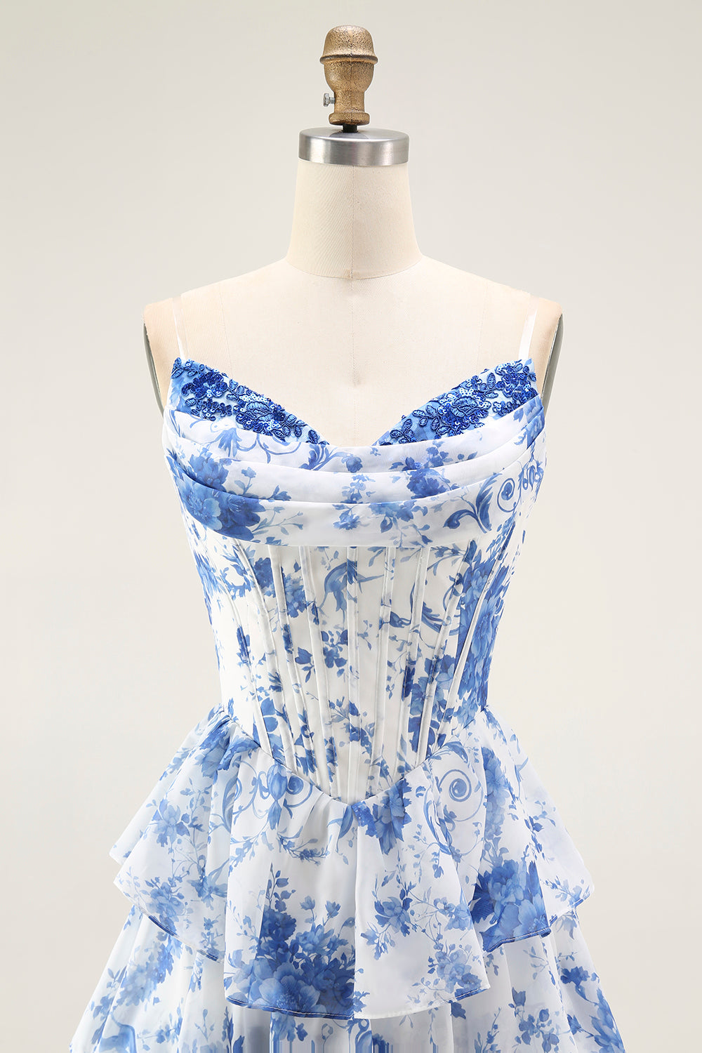 Vestido largo de baile con corsé en capas de flores blancas y azules con abertura