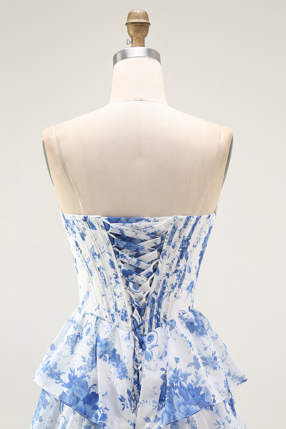 Vestido largo de baile con corsé en capas de flores blancas y azules con abertura