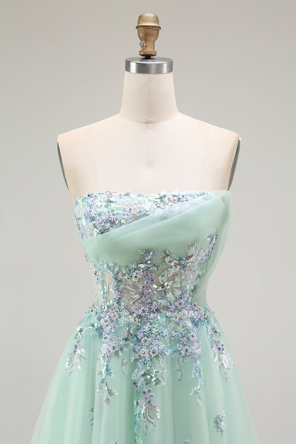 Vestido largo de fiesta con corsé transparente de tul sin tirantes verde con apliques