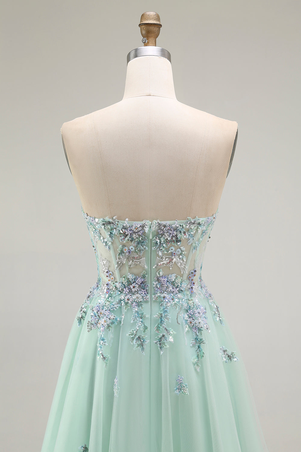 Vestido largo de fiesta con corsé transparente de tul sin tirantes verde con apliques