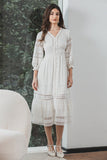 Vestido blanco de encaje largo con mangas largas