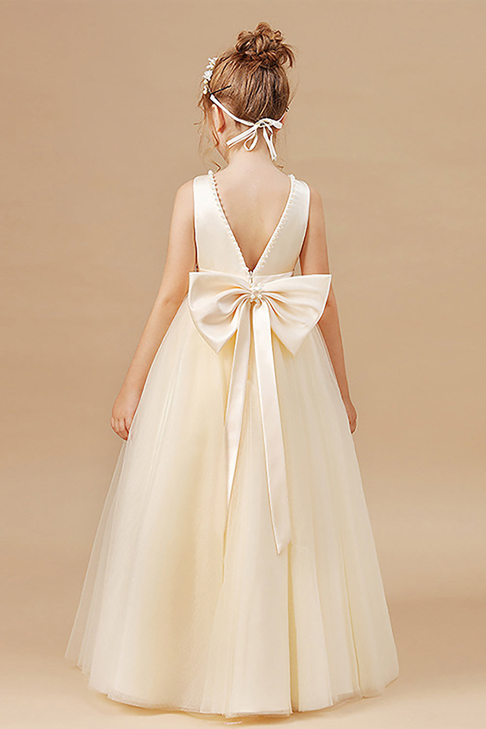 Vestido blanco de niña de flores Bowknot sin mangas de una línea con perlas