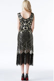 Vestido flapper con flecos dorados negros brillantes