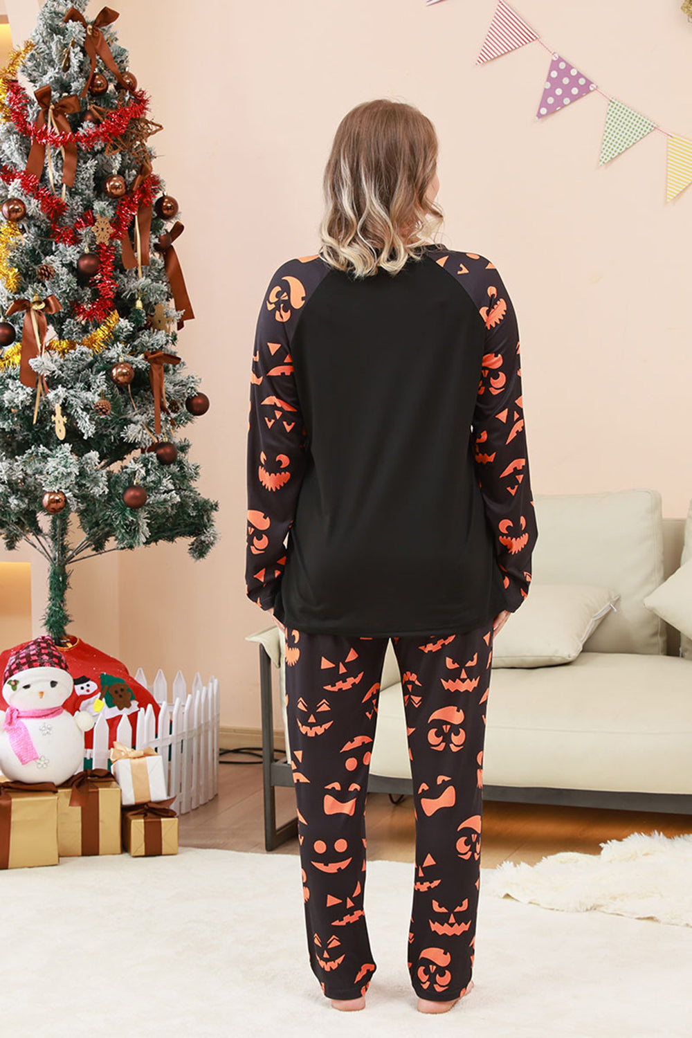 Conjunto de pijama familiar de Halloween estampado con estampado de truco o trato negro