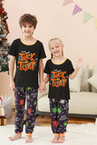 Conjunto de pijama familiar de Halloween con estampado de araña negro y naranja