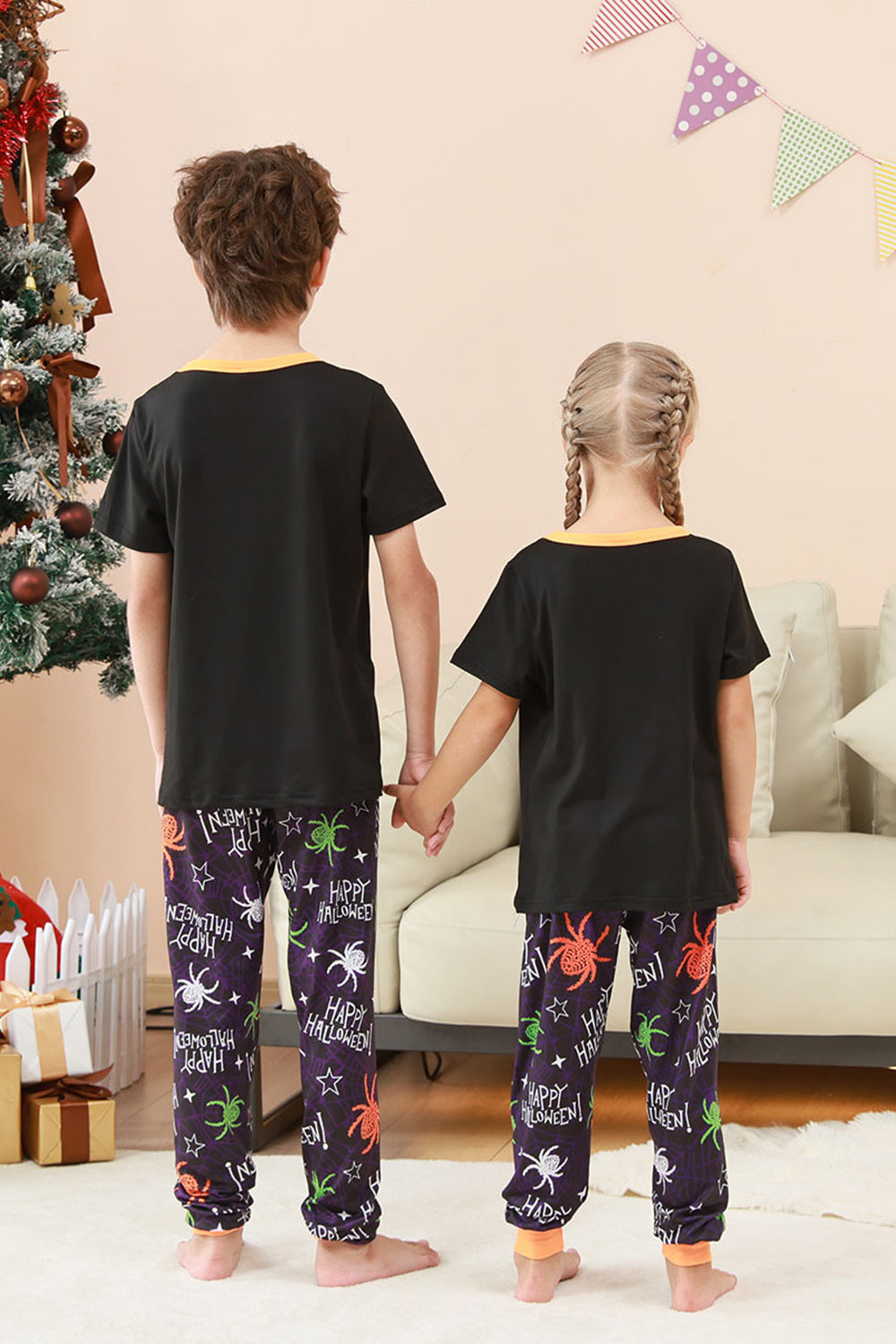 Conjunto de pijama familiar de Halloween con estampado de araña negro y naranja