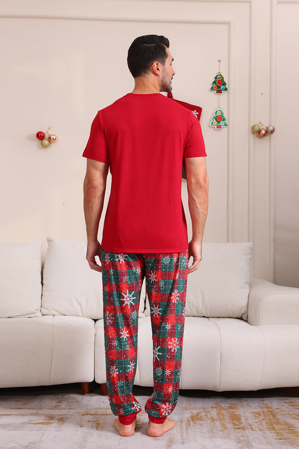 Conjuntos de pijamas familiares rojos Feliz Navidad
