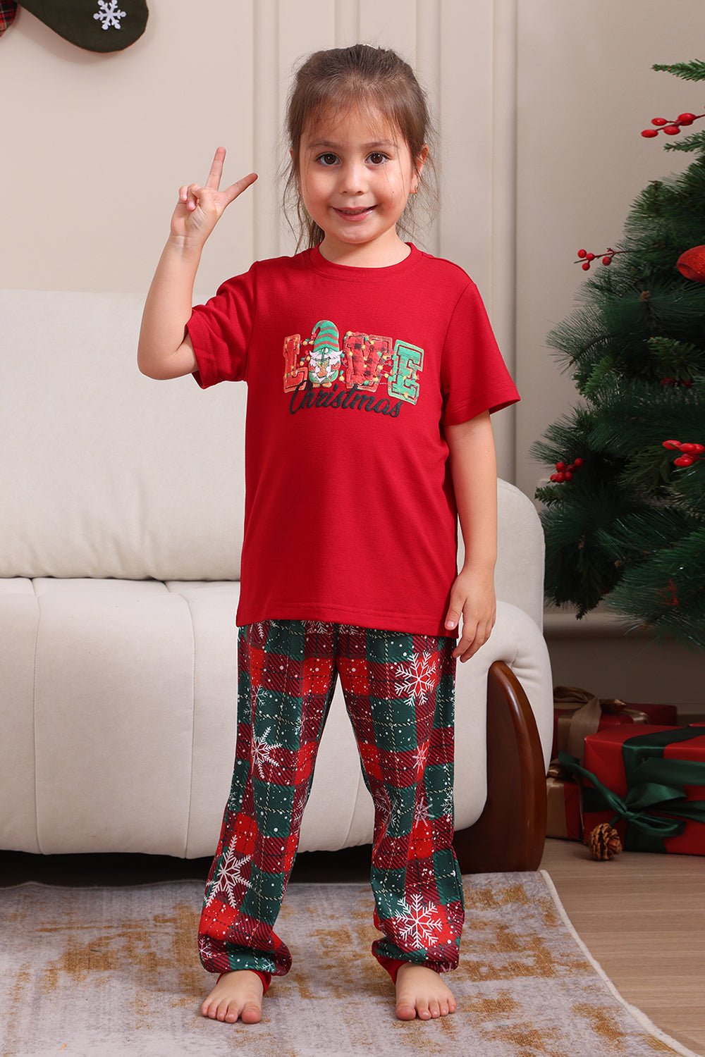 Conjuntos de pijamas familiares rojos Feliz Navidad