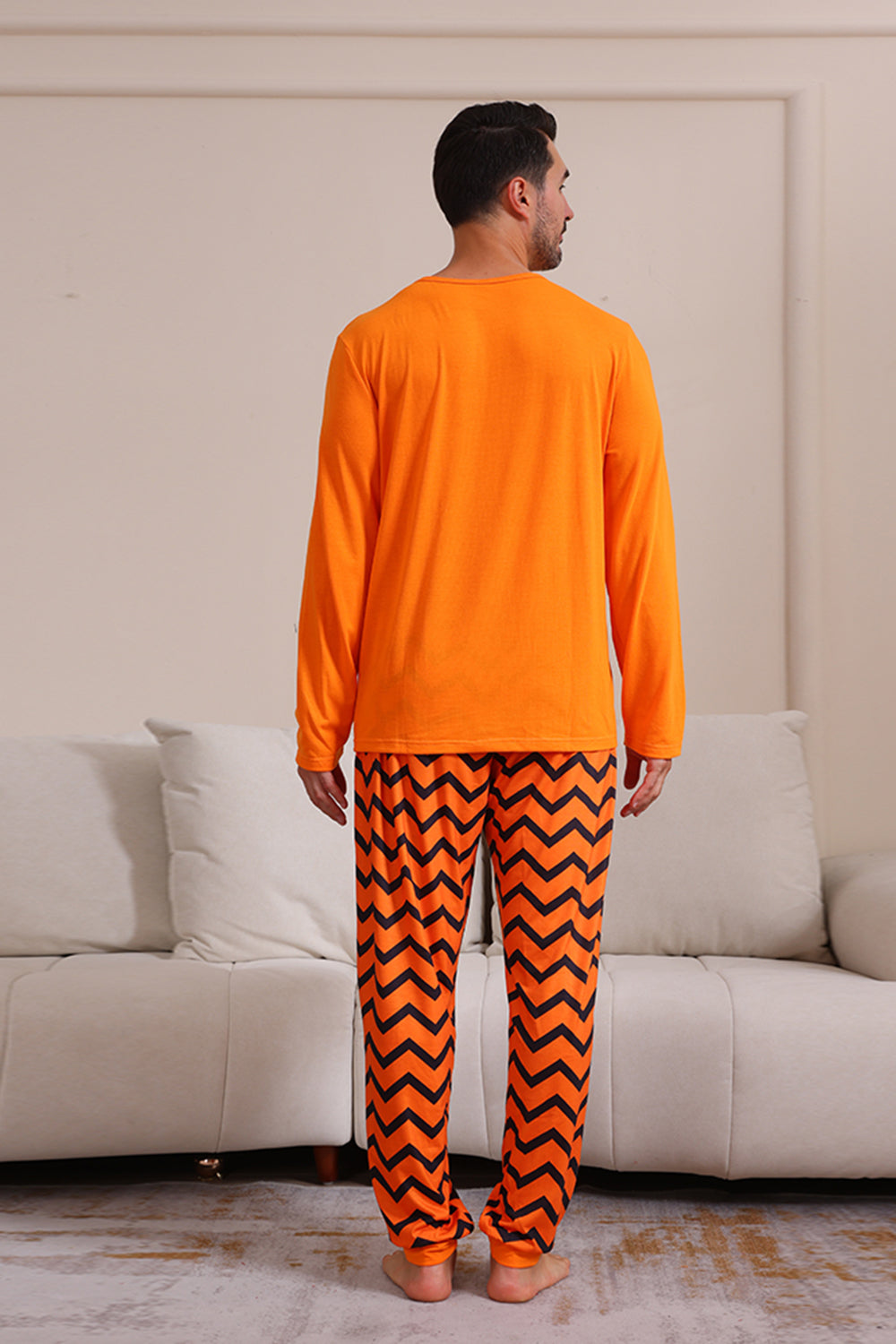 Pijama familiar de Halloween a rayas naranjas