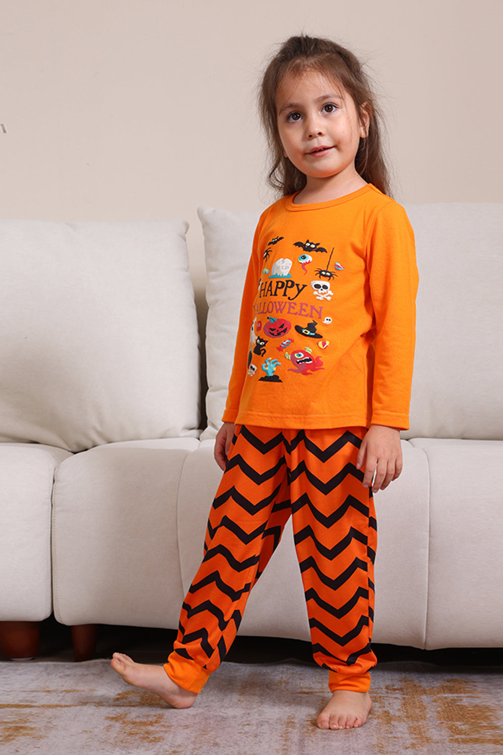 Pijama familiar de Halloween a rayas naranjas