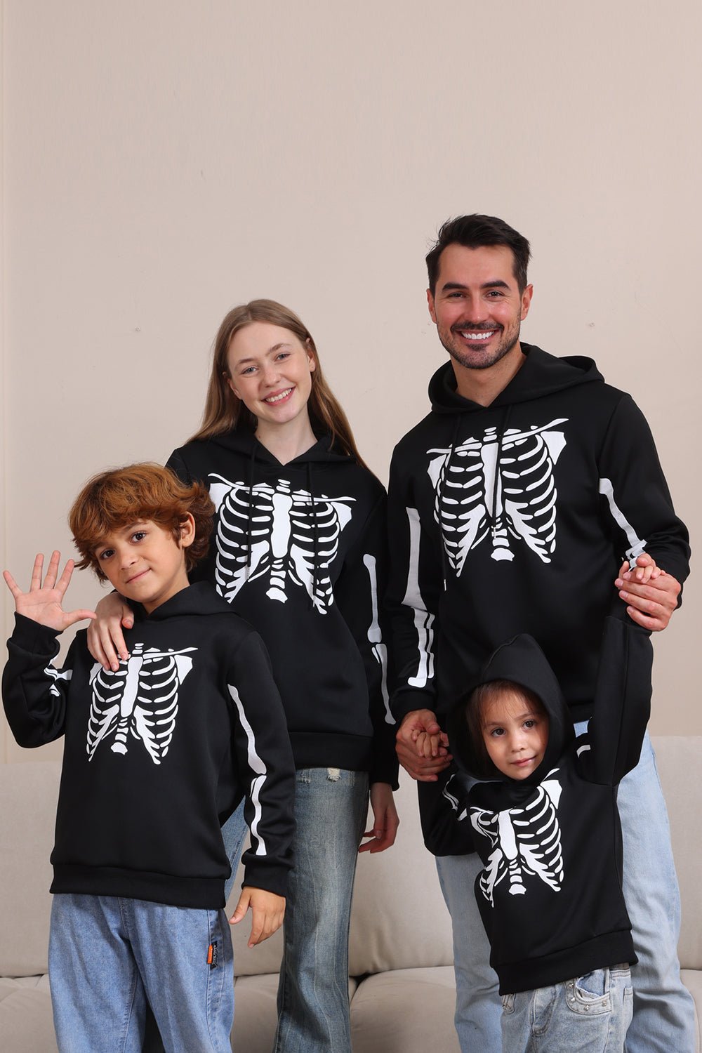 Sudaderas familiares de Halloween con capucha Black Skeleton
