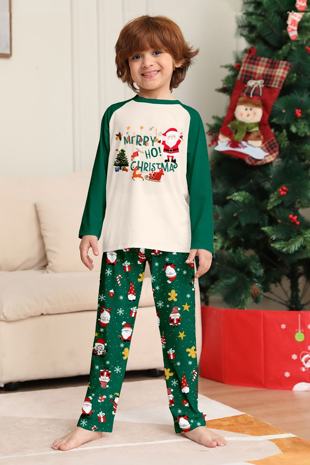 Conjuntos de pijamas a juego con estampado navideño verde oscuro para la familia de Santa