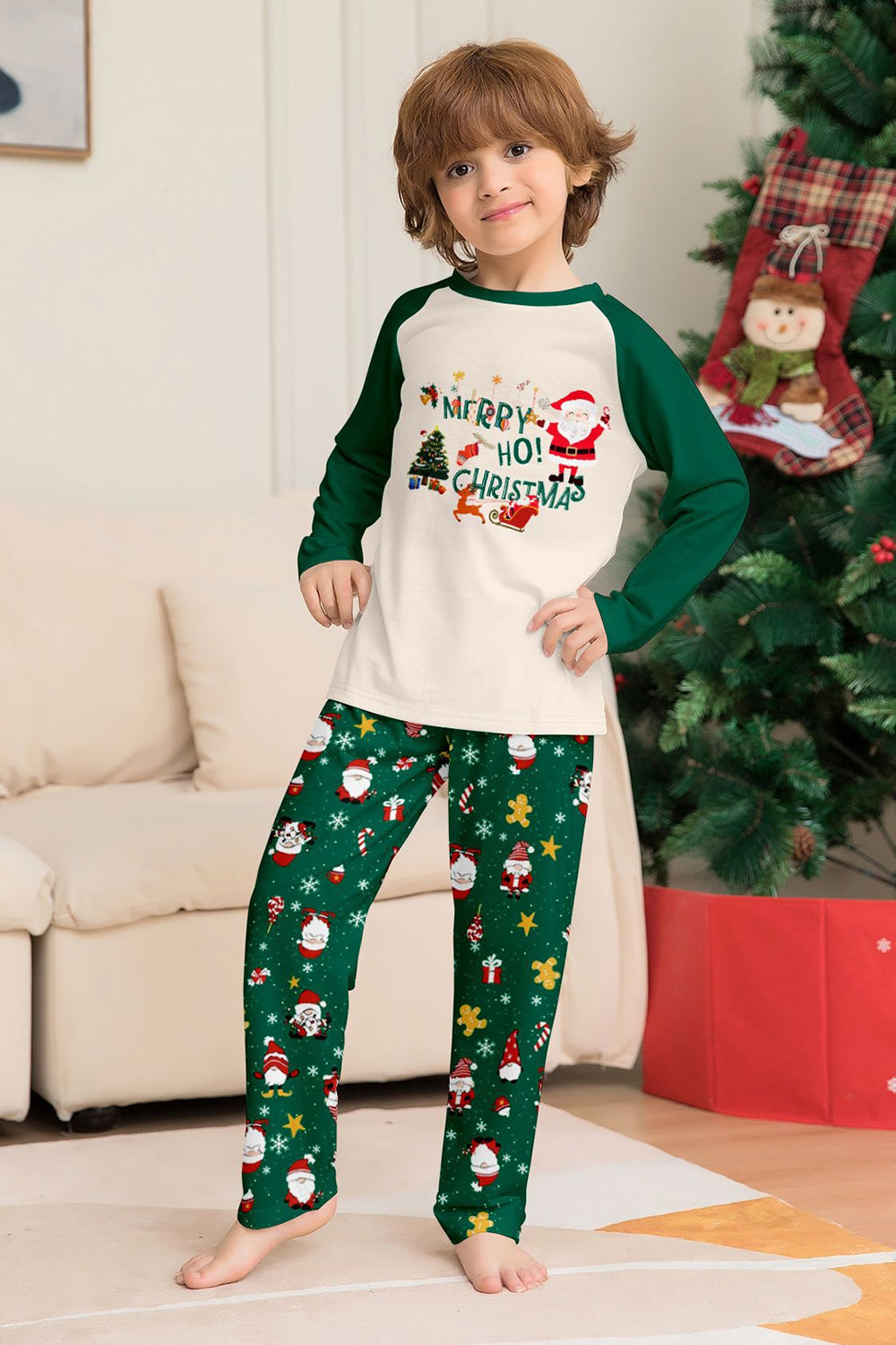 Conjuntos de pijamas a juego con estampado navideño verde oscuro para la familia de Santa