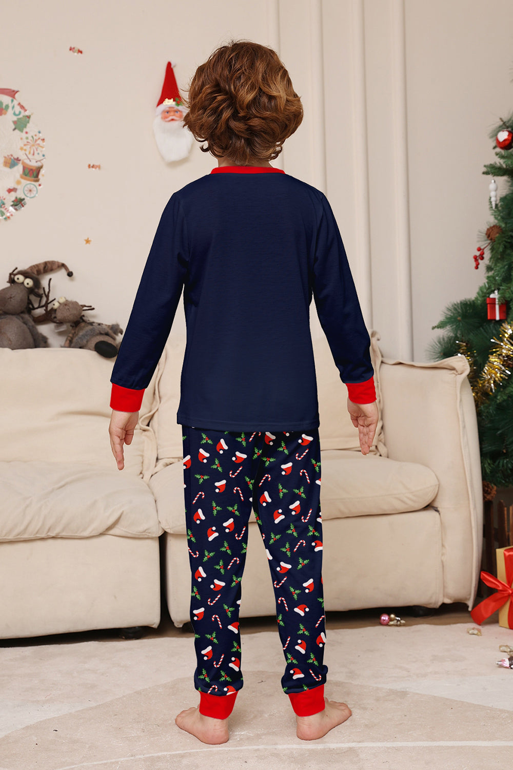 Conjunto de pijamas a juego con estampado de feliz Navidad en azul marino