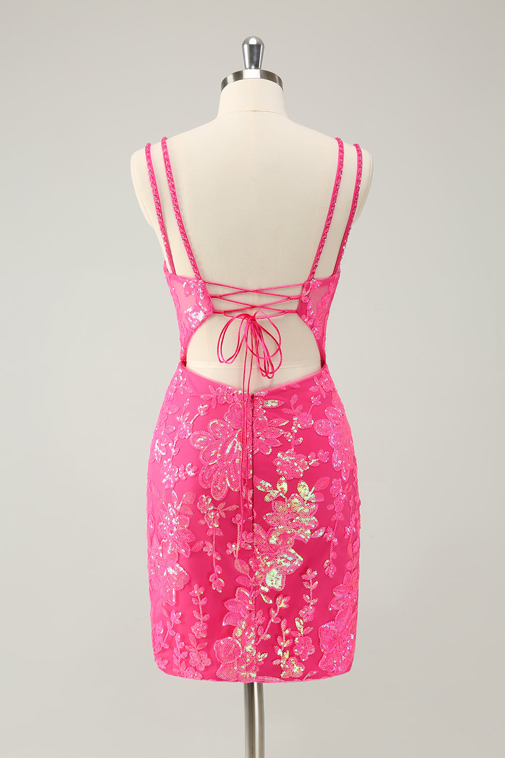 Precioso vestido de cóctel con purpurina y cordones rosa intenso con abertura