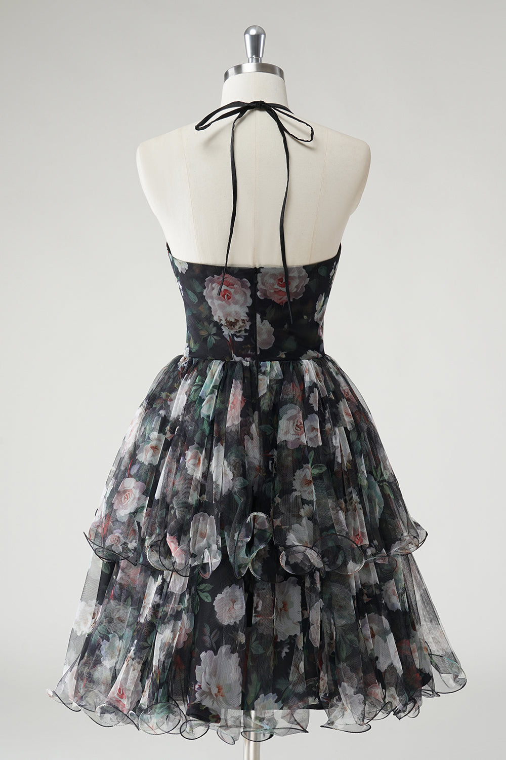 Vestido de invitada de boda floral halter escalonado negro de una línea con dobladillo desmontable